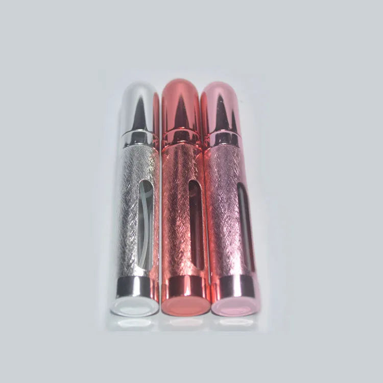 Slim 12ml aluminium travel perfume bottle in six colour options: blue, gold, pink, red, silver, violet.