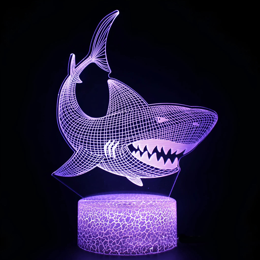 Shark Series 3D table lamp with acrylic light plate and remote control showing colour changing capability