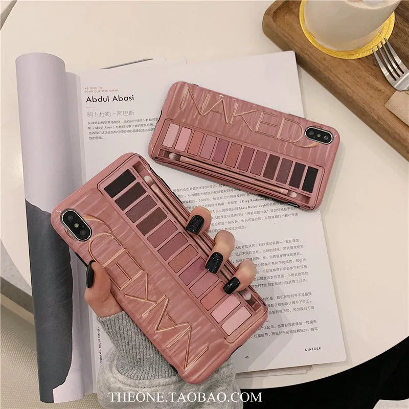 Silicone iPhone case with an eye shadow colour palette design, shown in Flesh and Grey colours.