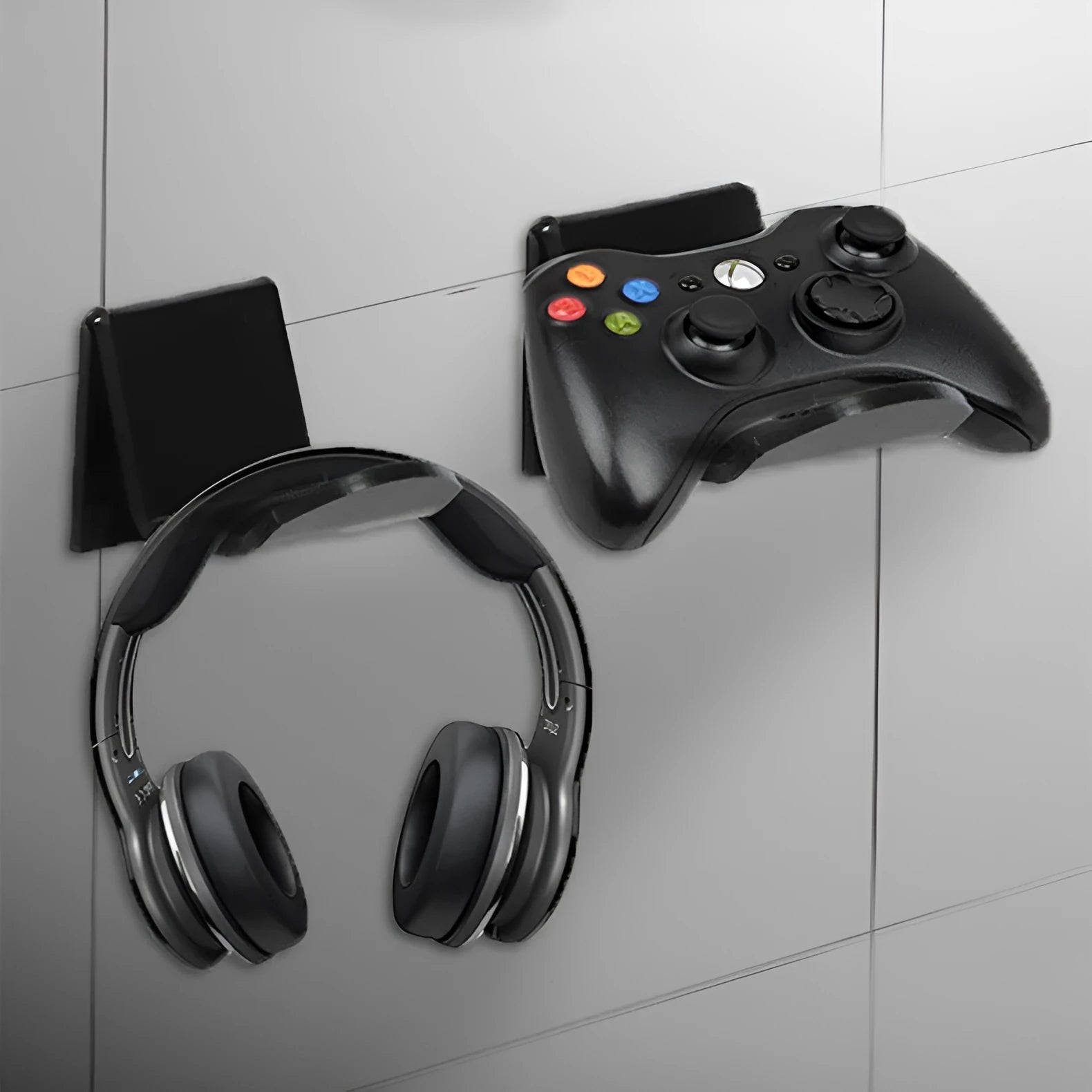 Universal game controller bracket accessory shown in black, white, and transparent colour options