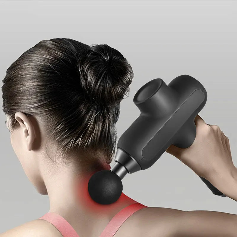 Handheld electric muscle relaxation massager with six different coloured massage heads on a black background.