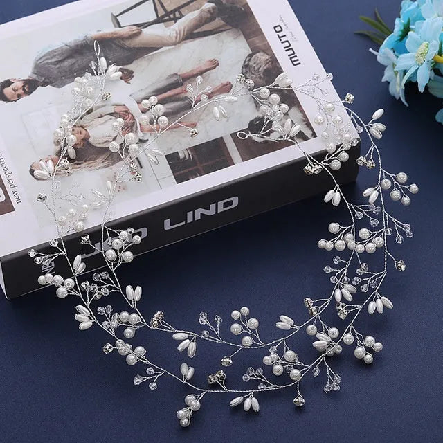 Gold and silver long hair band for weddings with crystal and pearl decoration on a wired base.