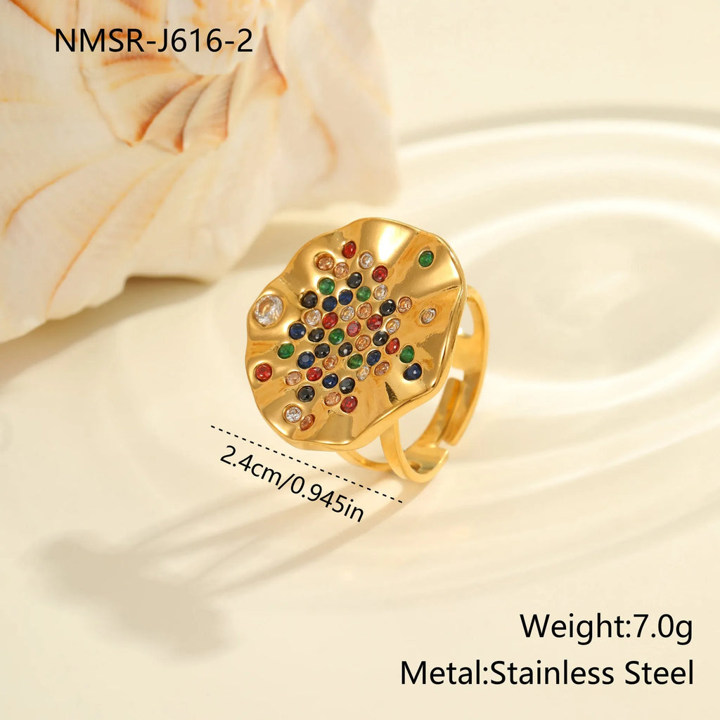 Geometric stainless steel ring with pleated detailing and inlaid colour diamond titanium accents