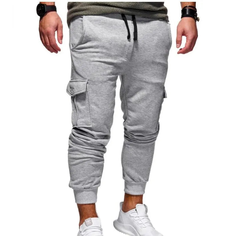 Men sport jogger pants in stretch fabric with Lycra, 95.5% polyester, available in multiple colours