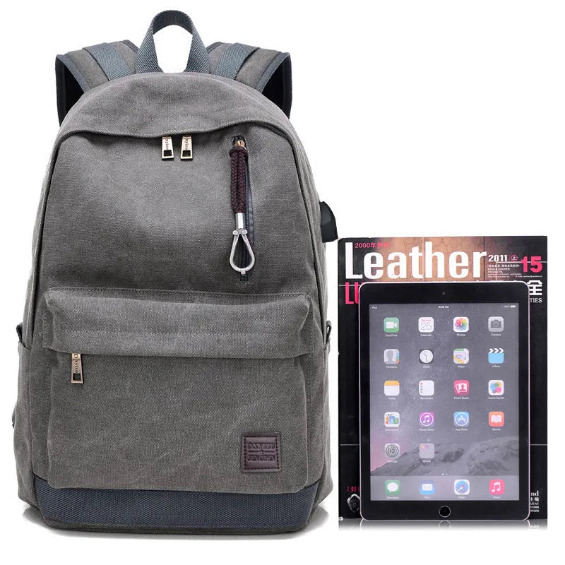 Canvas backpack with USB charging port in grey colour showing multiple compartments