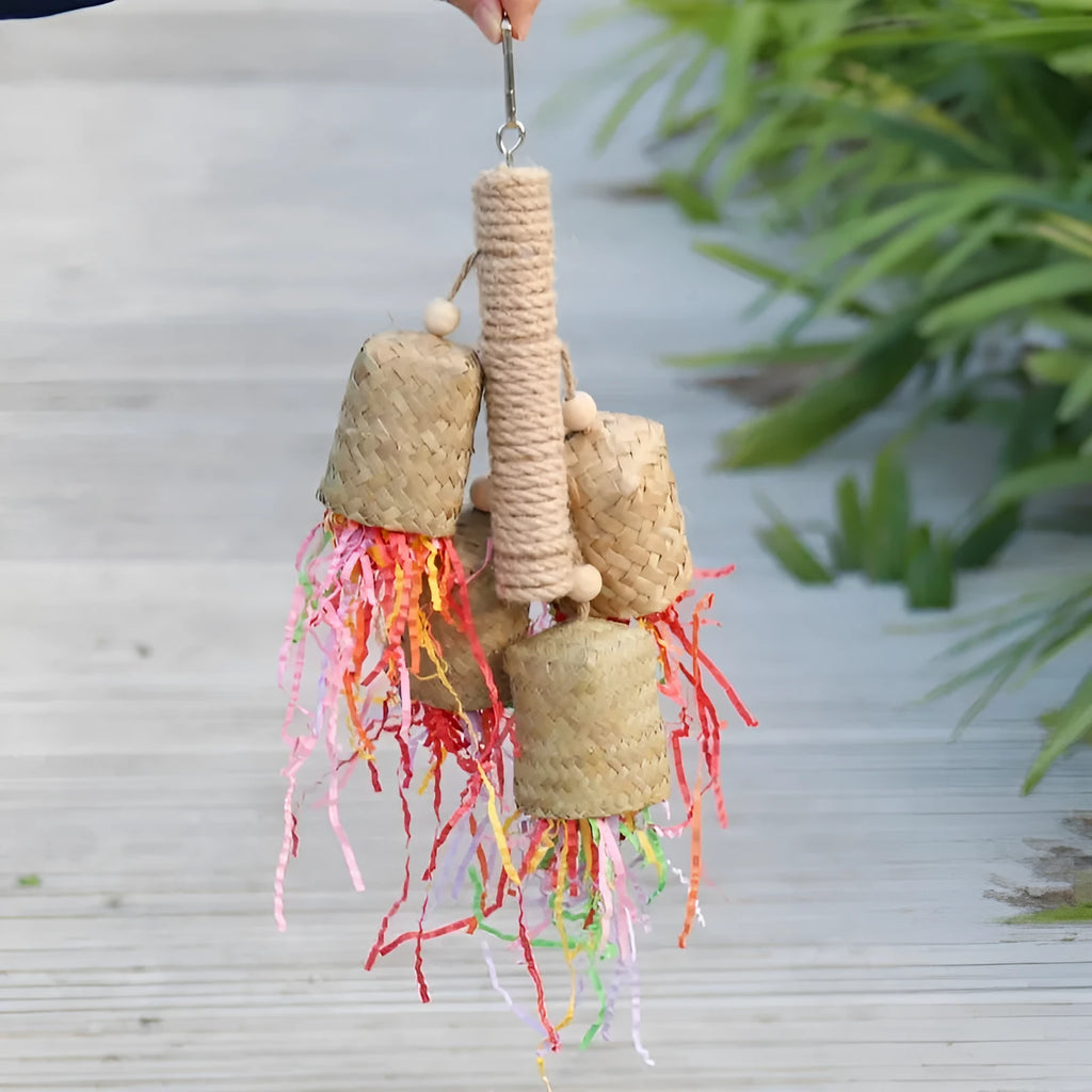 Wood and sisal shredded paper bird toy for parrots with colourful paper strips