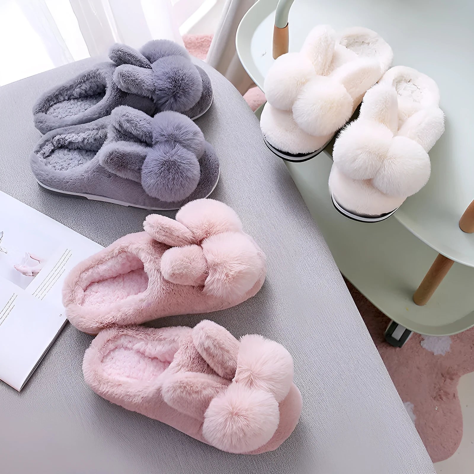 Women's rabbit fur slippers in grey with flower details and a high upper.
