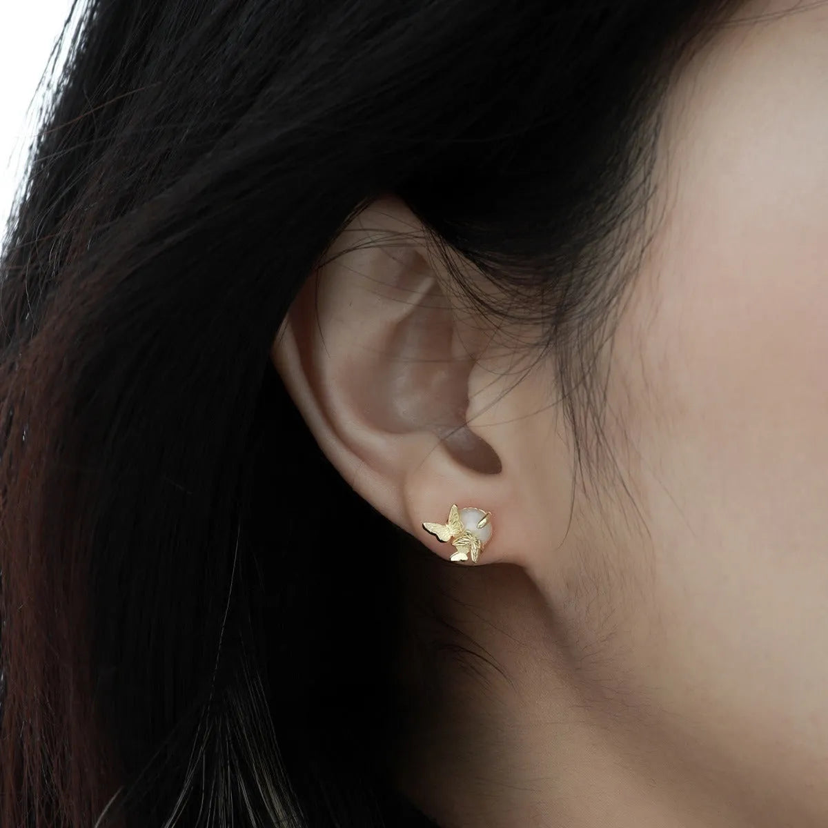 Butterfly ear studs in 925 silver with animal zodiac design and electroplated gold or white gold finish