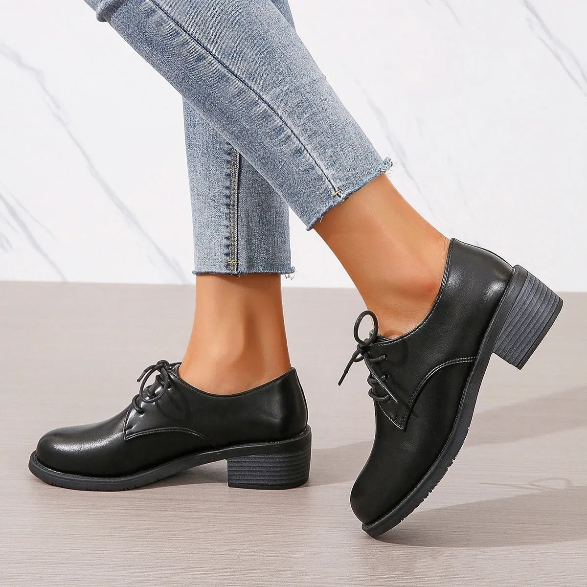 Black women's professional work shoes with thick chunky heel and low-top design