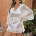White polyester beach blouse with sun protection for women's swimming and beach activities