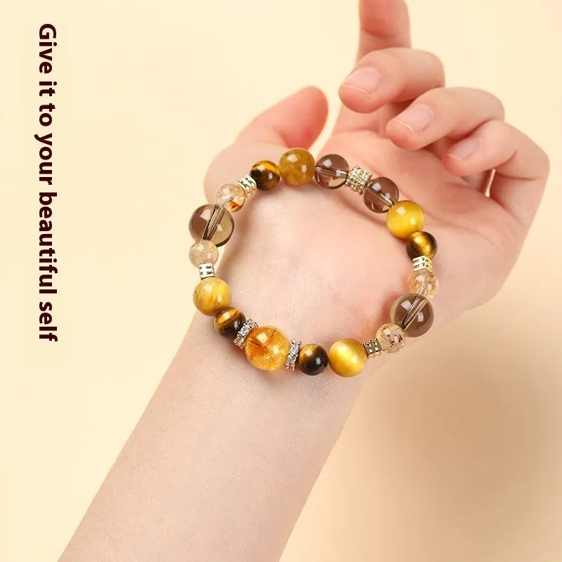 Yellow Tiger-eye crystal bracelet with 10mm geometric tower beads on wrist