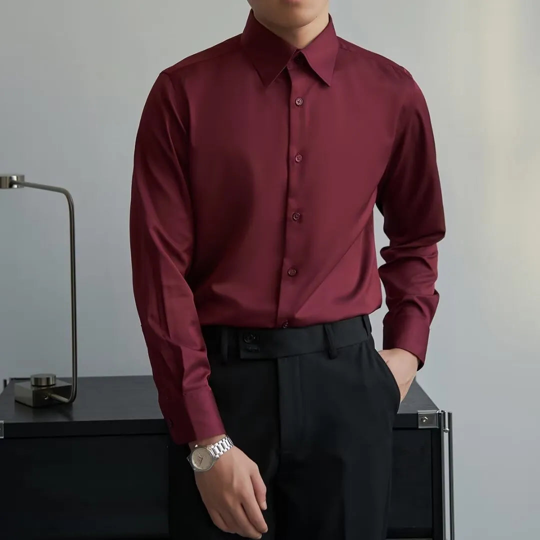 Man wearing a black Japanese retro style loose-fit long sleeve cardigan shirt.