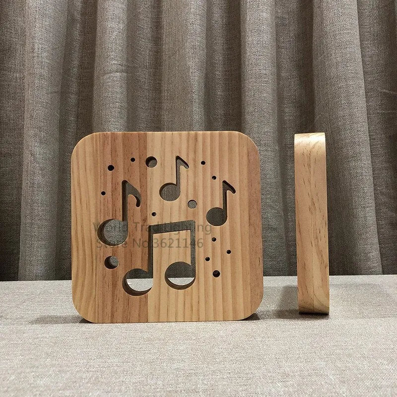 Square pine wood USB LED lamp with warm white light on a desk.
