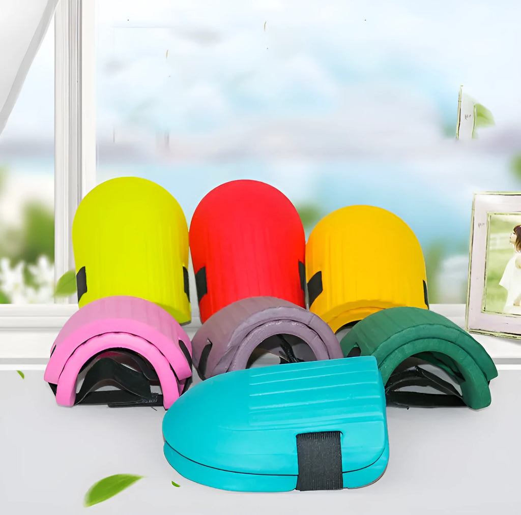 A pair of black EVA foam knee pads for gardening, showing their rectangular shape and soft texture.