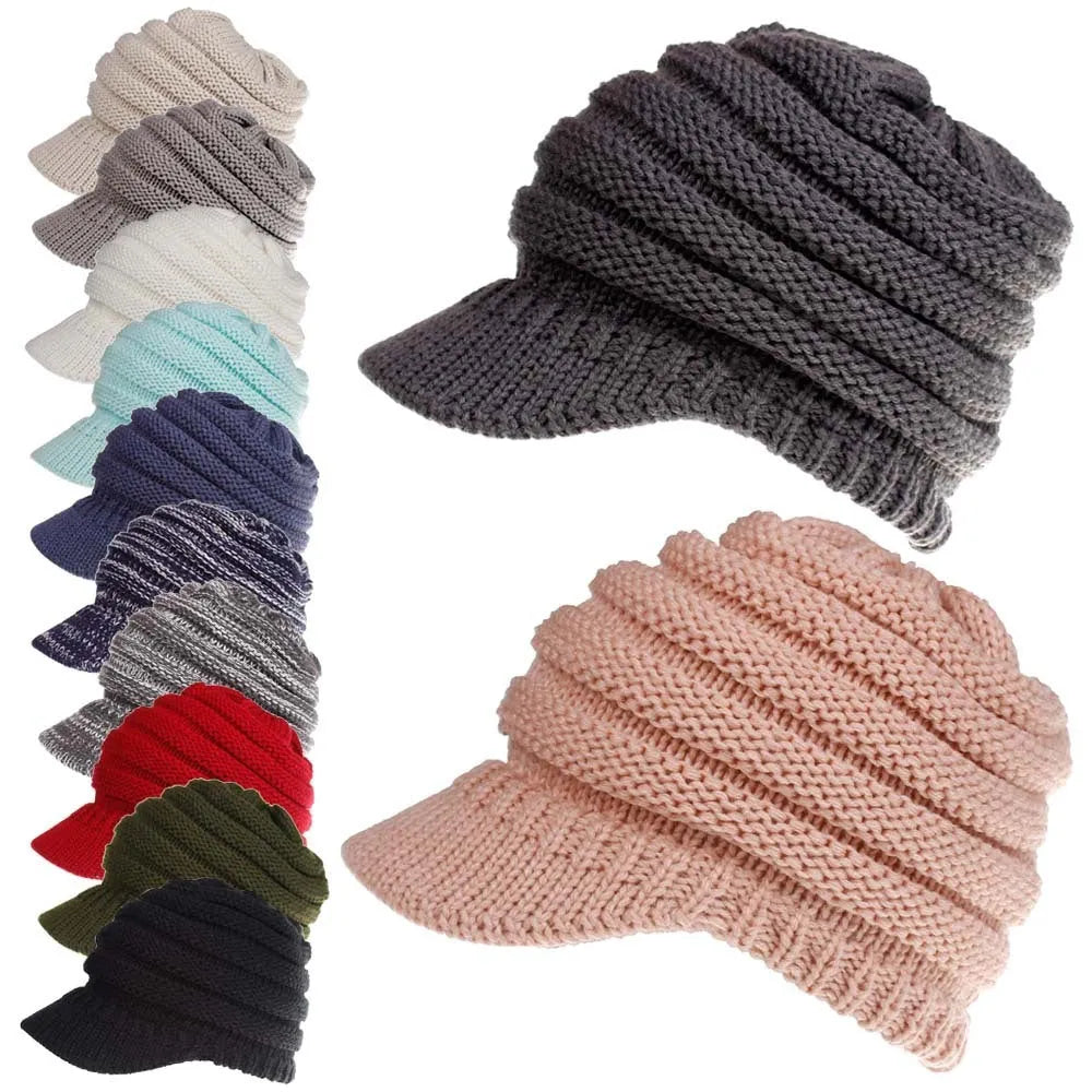 Women's soft acrylic ponytail beanie in light grey, showing the opening for a ponytail.