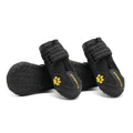 Pair of non-slip waterproof luminous dog shoes in black with double velcro closure