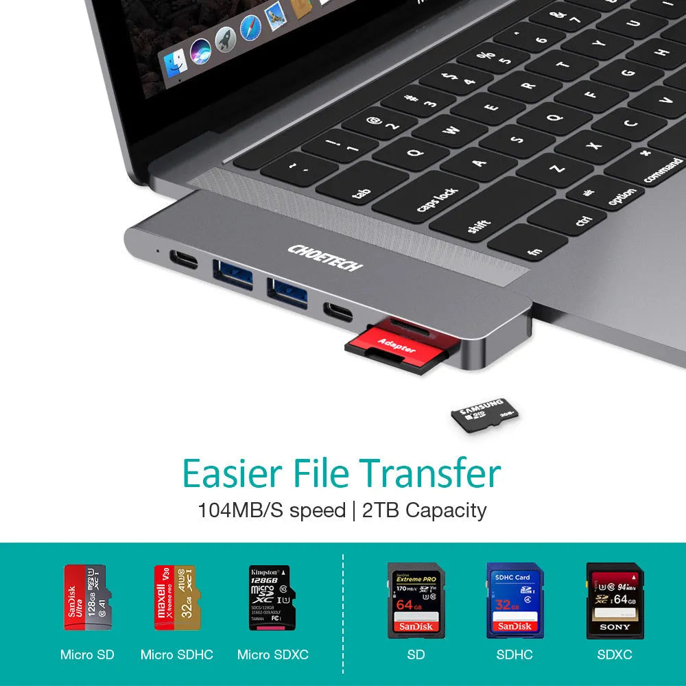 Silver USB-C to multi-port adapter hub with SD card slot, HDMI, USB ports, and PD charging