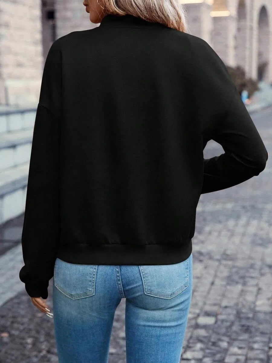 Black women's casual zip jacket with long sleeves and faux pocket detailing