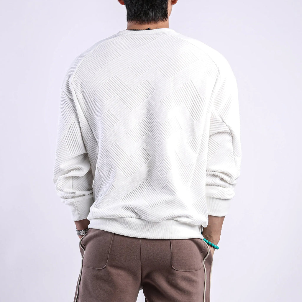 Men's solid colour twill jacquard long sleeve pullover sweater on a hanger.