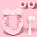 Facial brush with nylon bristles and coral fleece hair band set in purple, gray, white or pink colours