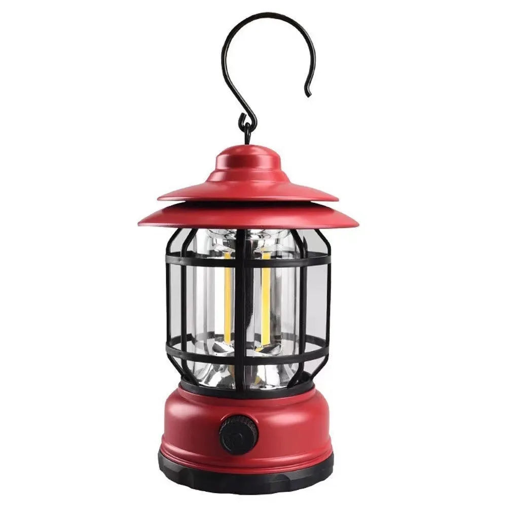 Dark green portable camping head lamp lantern with dimensions 16.6cm by 6.7cm by 9.6cm