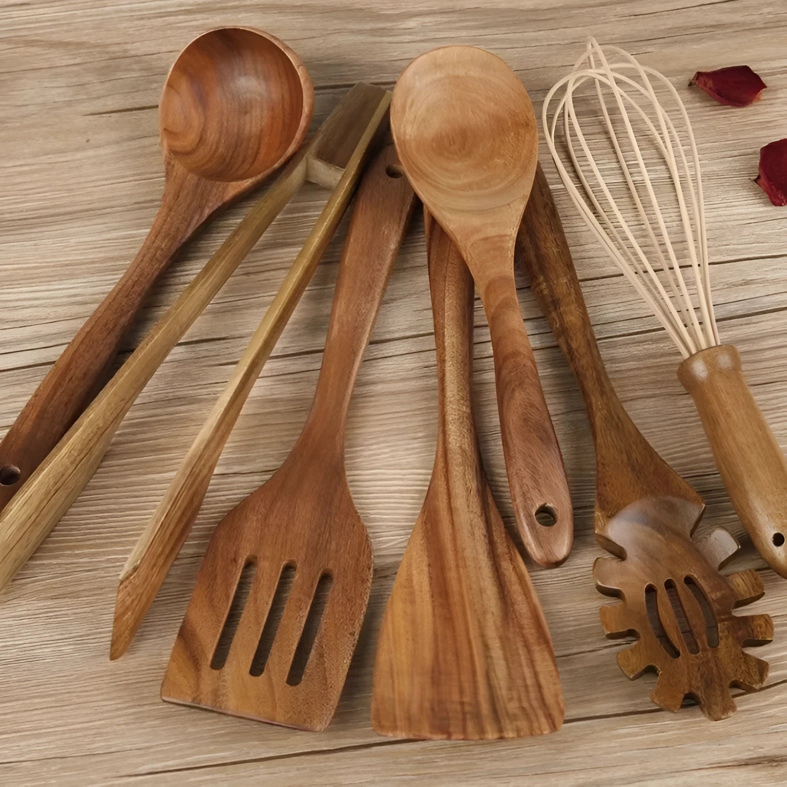 Set of seven wooden cooking utensils with spoon and shovel shapes for use with non-stick pans.