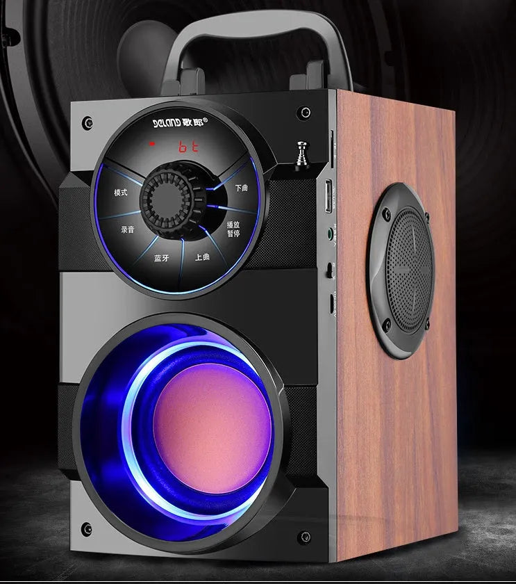 Black portable mini home audio system with subwoofer, satellite speakers, and USB charging cable