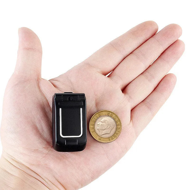 Mini flip phone in gold, showing closed flip cover design with small screen.