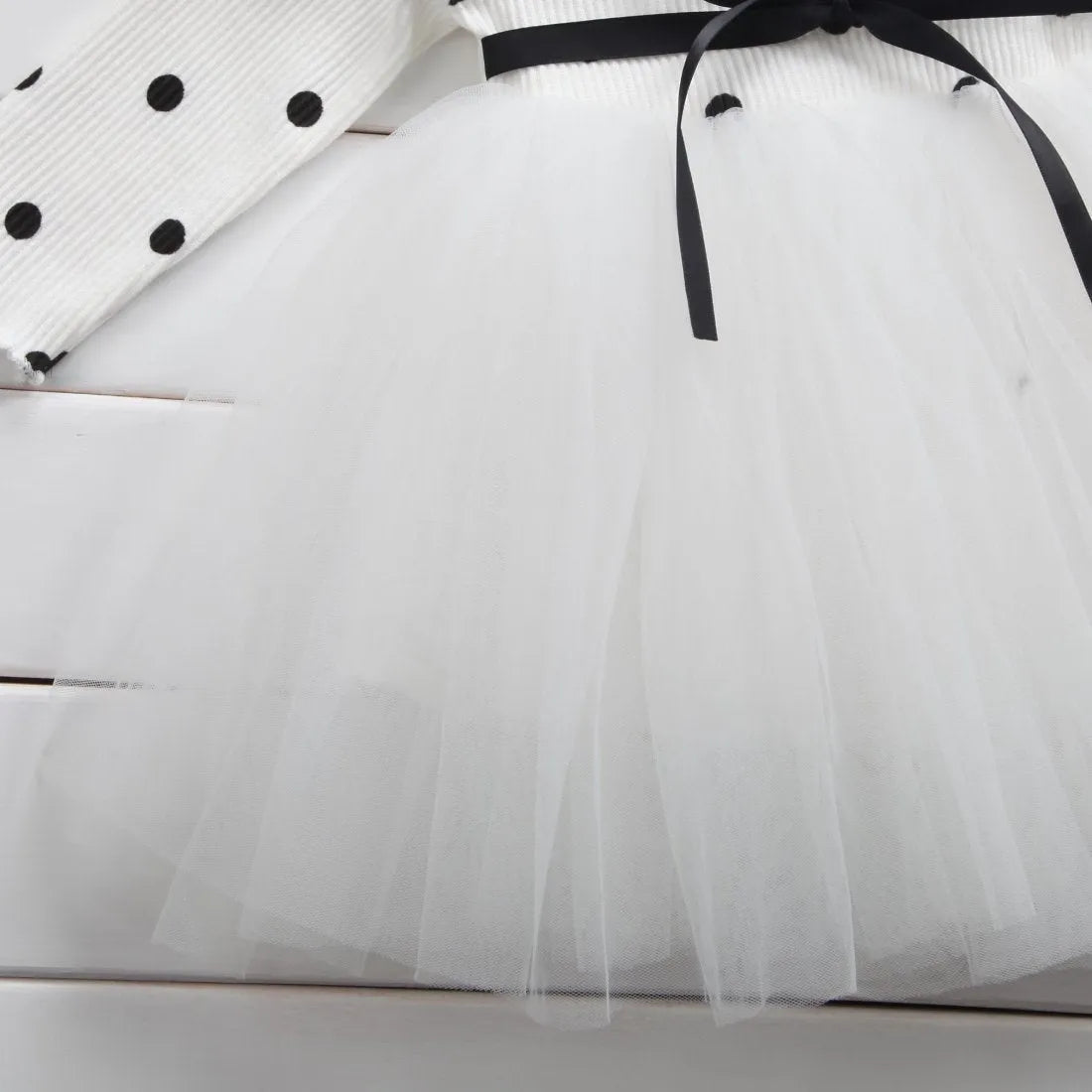 Girls long sleeve black tutu lace dress with lace trim for birthday parties.