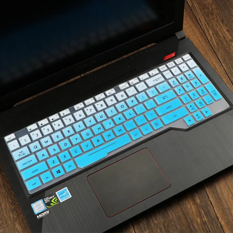 ASUS VivoBook 15 X513 laptop with a translucent mint coloured silicone keyboard protector fitted.
