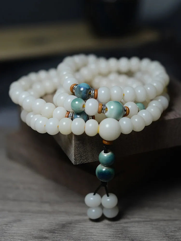 White jade bodhi root bracelet with 108 flat round beads in unisex national style.