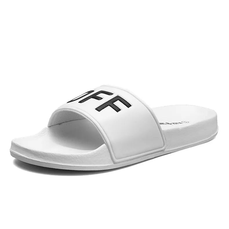 Men's black open-toe rubber slippers showing viscose sole construction