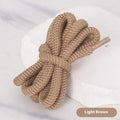 Round oval rope shoelaces in multiple colours including black, pink, blue, and red, shown in different lengths.