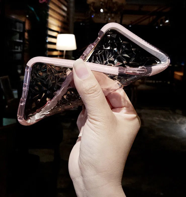 Striped TPU iPhone case shown in pink, white and black edge colour options