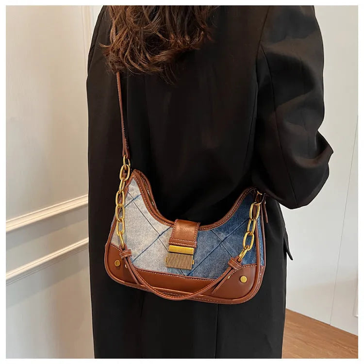 Brown denim women's bucket shoulder bag with diamond chain detailing and double straps
