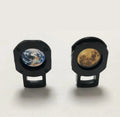 Earth and Moon star projector night light with adjustable hose bracket on bedside table