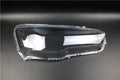 Transparent plastic headlight housing cover with 50mm x 30mm x 20mm dimensions