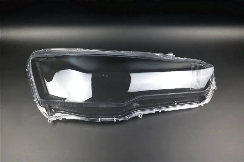 Transparent plastic headlight housing cover with 50mm x 30mm x 20mm dimensions