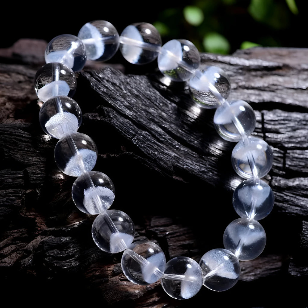 Women's white crystal bracelet with a pyramid charm and Ruyi symbol, showing different bead size options.