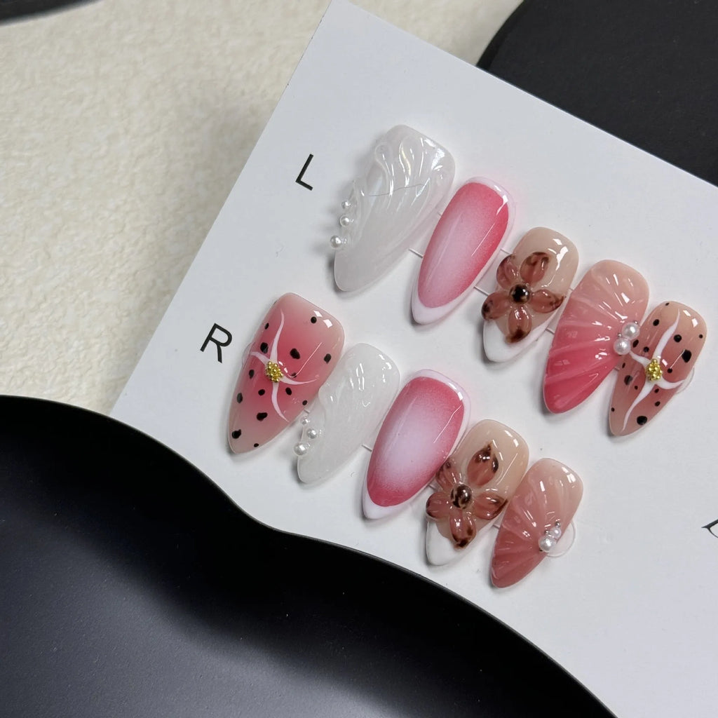 Hand-painted three-dimensional carved nail beauty patches in assorted colours and patterns.