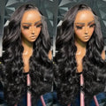 Black medium length curly synthetic wig showing defined wave pattern and full-head coverage