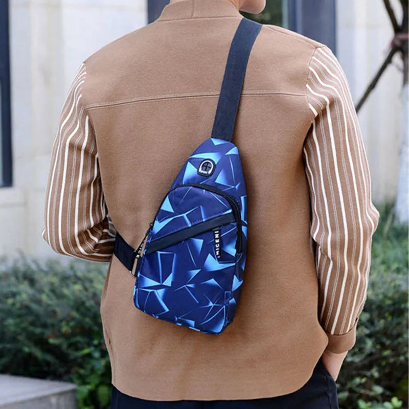 Men's crossbody messenger bag with earphone hole in Oxford cloth, showing zipper opening and shoulder strap