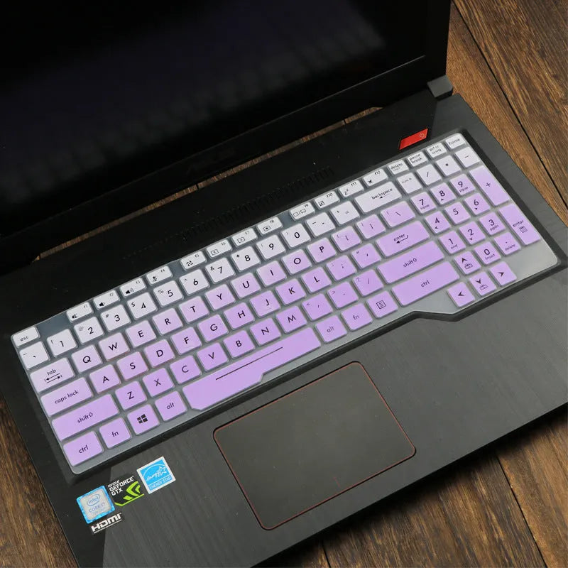 ASUS VivoBook 15 X513 laptop with a translucent mint coloured silicone keyboard protector fitted.