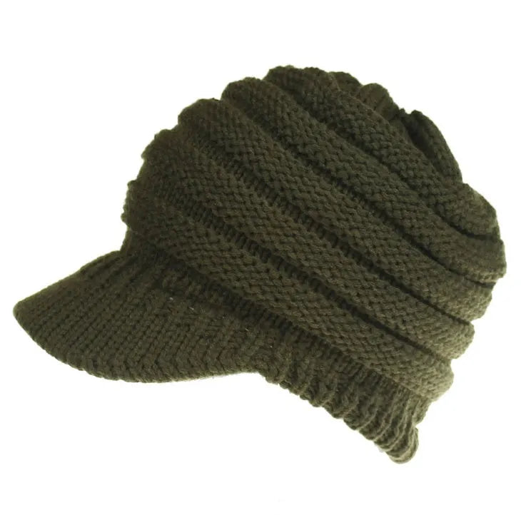 Women's soft acrylic ponytail beanie in light grey, showing the opening for a ponytail.