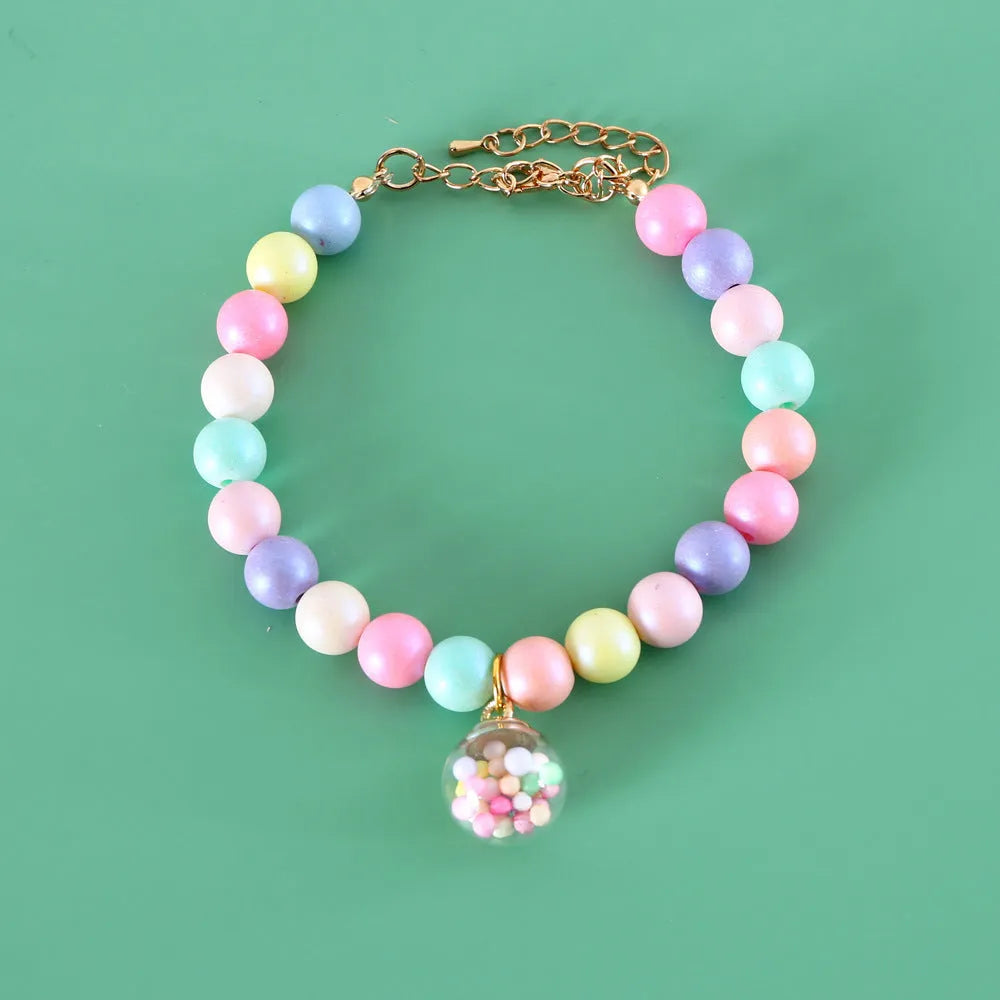 Macaron-themed colourful resin collar and bracelet set for cats or dogs in six design options.