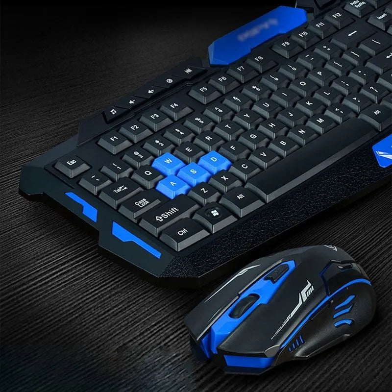 Black and blue wireless keyboard and mouse set on a desk, showing compact 48cm keyboard and ergonomic mouse.