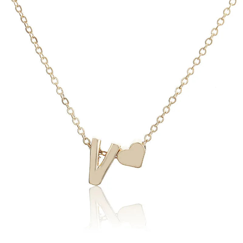 Peach-shaped alloy necklace pendant in a gold finish on a chain.