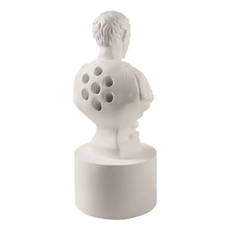 White American creative character model synthetic resin pen holder on a desk.