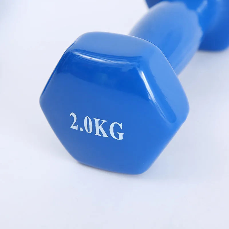 Bright coloured plastic-coated fitness dumbbells in 0.5kg, 1kg and 1.5kg weights for floor-protected workouts