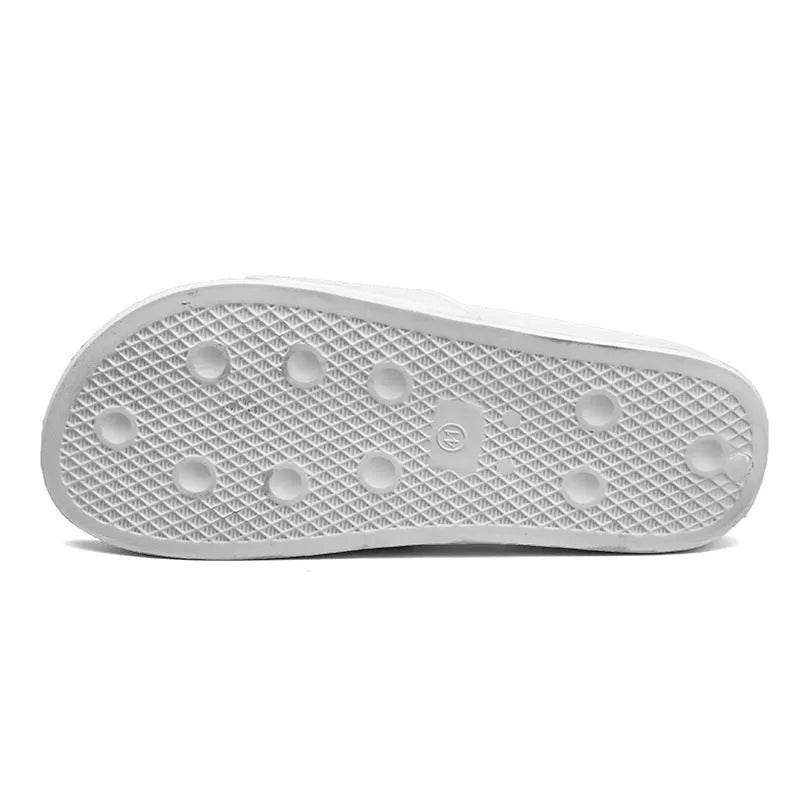 Men's black open-toe rubber slippers showing viscose sole construction